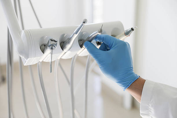 Professional Tooth Extraction technician working in Serenada, TX